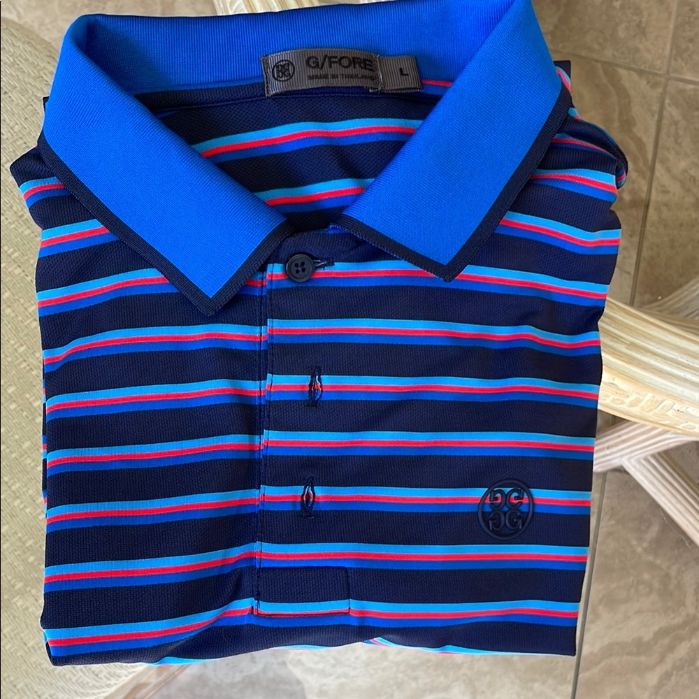 G/FORE Blue and Red golf Shirt with Striped Design